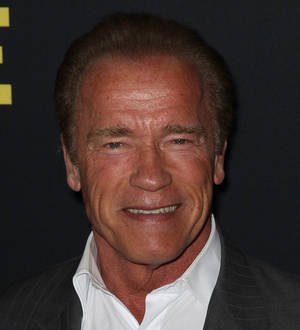 Arnold Schwarzenegger flouts smoking ban