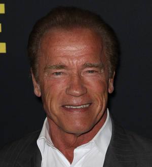 Arnold Schwarzenegger flouts smoking ban