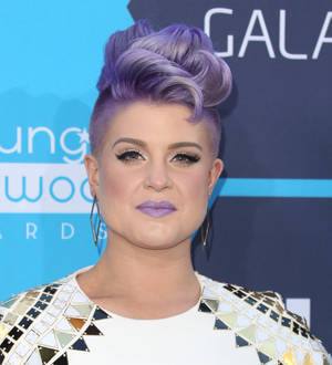 Kelly Osbourne teases fans with book project