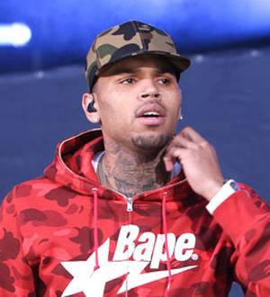 Chris Brown disputes report of canceled gay pride gig