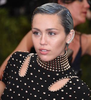Miley Cyrus: 'I'm happy to be single'