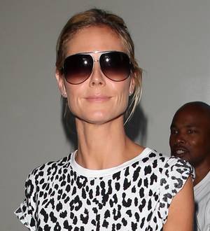 Heidi Klum strips off for Project Runway poster