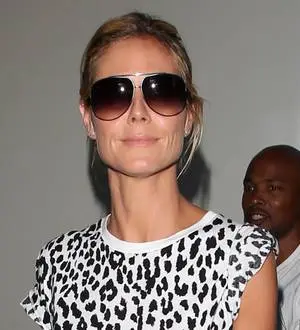 Heidi Klum strips off for Project Runway poster