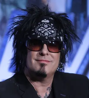 Motley Crue and Kiss brave floods to play for fans