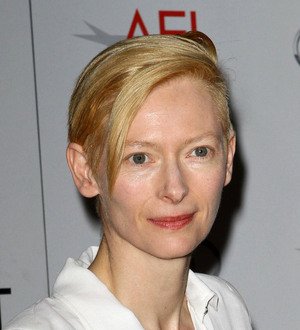 Swinton cuts promo duties to clean kids' school