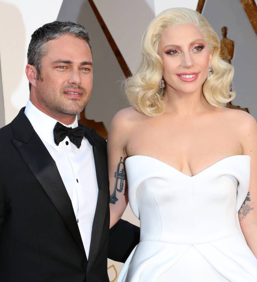Taylor Kinney supports Lady Gaga at Chicago tour stop