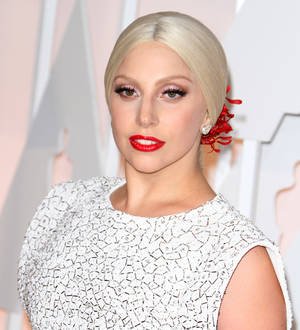 Lady Gaga supports Taylor Kinney in ski challenge