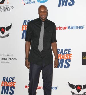Lamar Odom makes first public appearance at Kanye West's fashion show