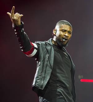 Usher turns wedding singer