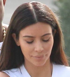 Kim Kardashian urged to consider surrogacy