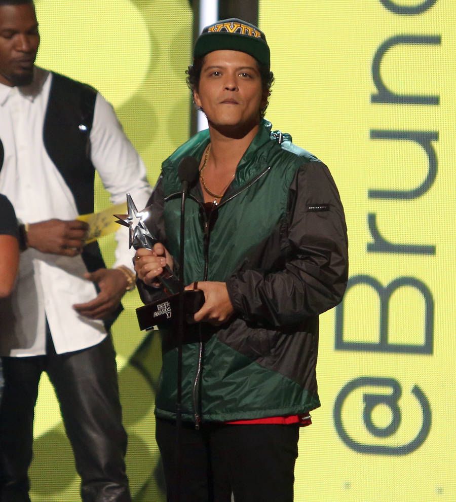 Bruno Mars sued by photographer for sharing childhood snap