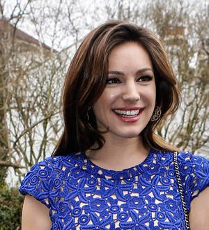 Kelly Brook leaves home unzipped
