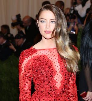 Amber Heard frolics with another woman in sexy art piece
