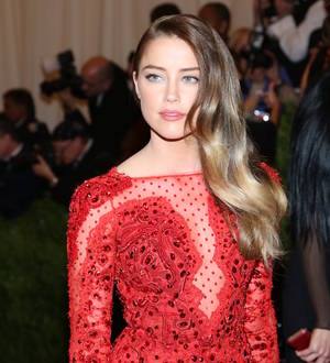 Amber Heard frolics with another woman in sexy art piece