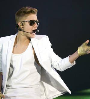 Justin Bieber recording musical journals on tour