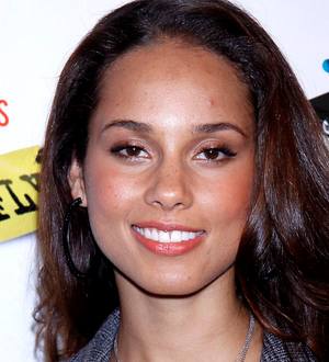 Alicia Keys surprises students at alma mater with instruments