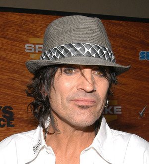 Grieving Tommy Lee mourns mother