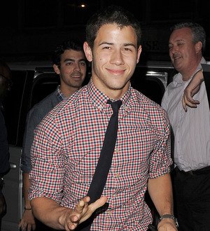 Nick Jonas and John Stamos stage impromptu gig at New York bar