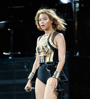Beyonce plays soccer with Brazilian kids