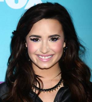 Demi Lovato refuses to let leg injury affect recording sessions