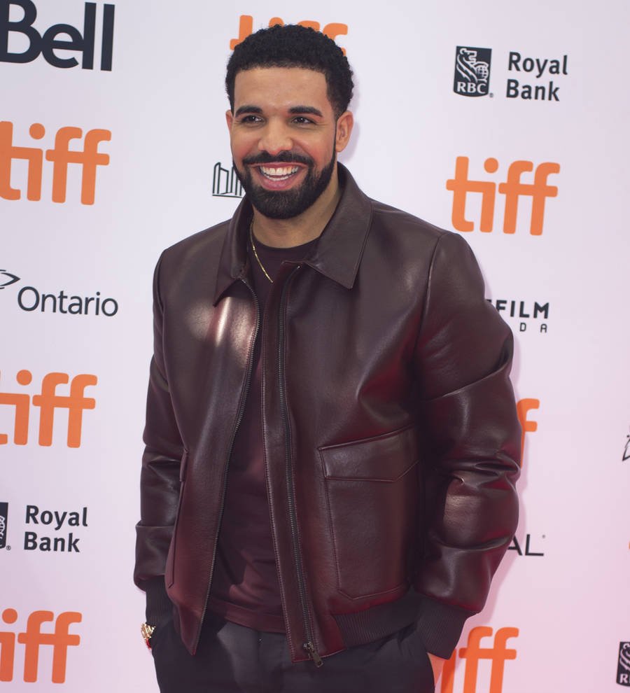 Drake gets Denzel tattooed on his arm