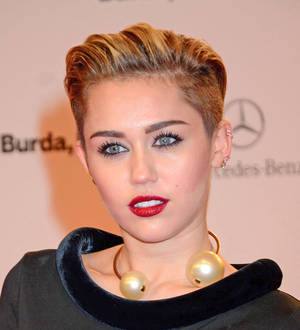 Billy Ray Cyrus buys Miley customised motorcycle for her 21st birthday