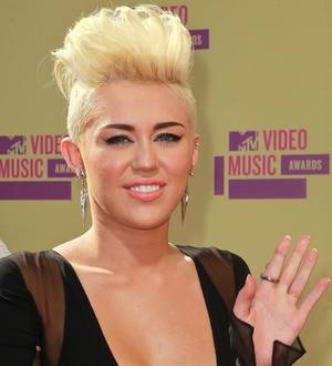 Miley Cyrus felt creepy shooting make-out scenes with Jones