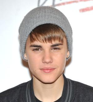 Justin Bieber auctions snake for charity