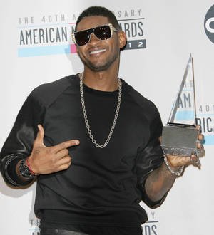 Usher left exhausted by strenuous Sugar Ray Leonard fitness regime