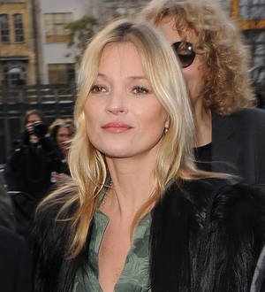Kate Moss donates,000 painting to charity
