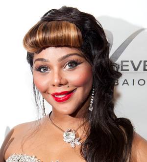 Lil' Kim moves sick father into her New Jersey home