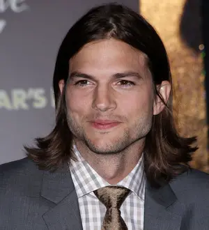 Ashton Kutcher 'just friends' with holiday companion