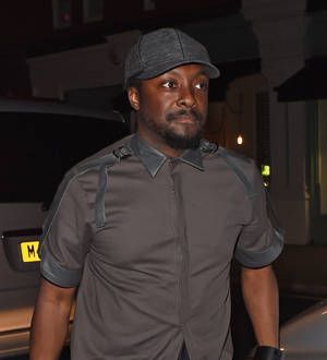 will.i.am uses his watch to DJ