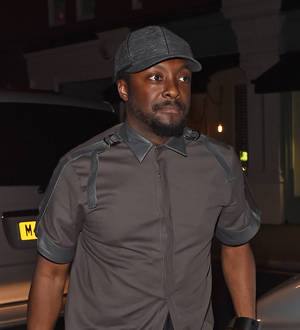 will.i.am uses his watch to DJ