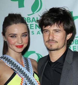 Orlando Bloom and Miranda Kerr promote rival airlines