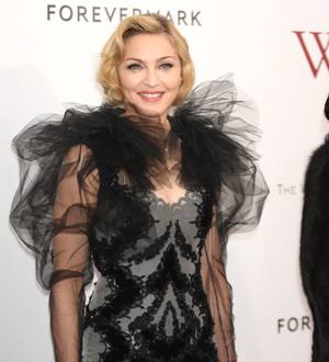 Madonna dedicates song to Elton John