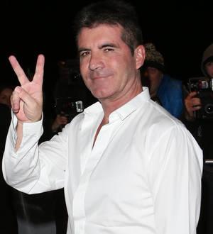 Simon Cowell egged in live TV attack