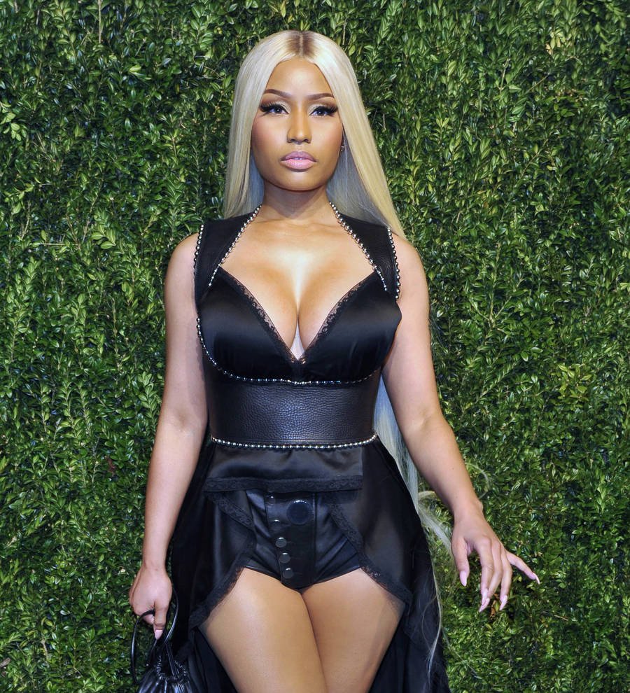 Nicki Minaj's extra-long pink braids for Motorsport video took 36 hours