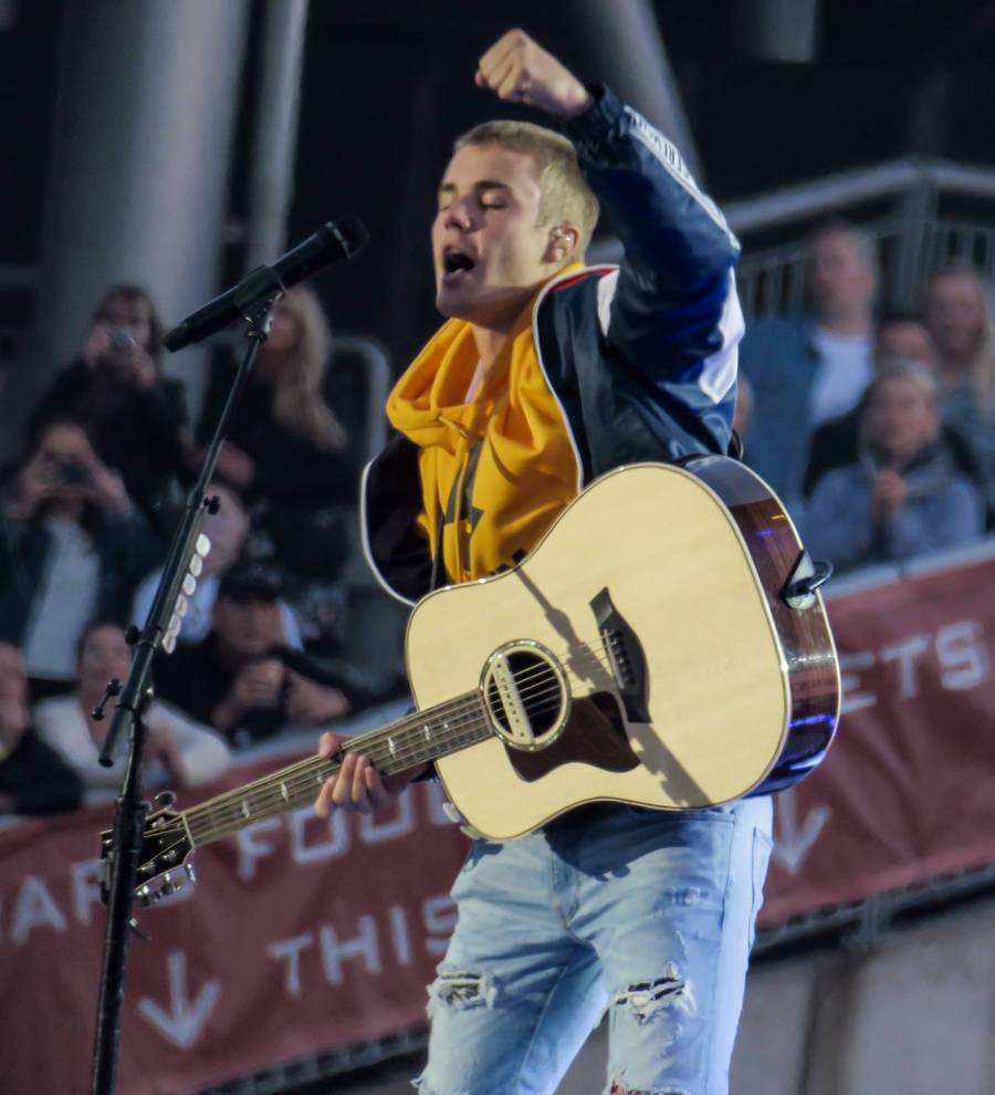 Justin Bieber makes U.S. chart history with top three tunes