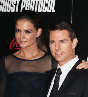 Tom Cruise settles divorce