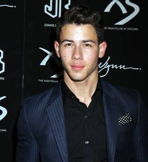 Nick Jonas' flight held at Los Angeles airport after shooting drama