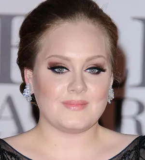 Adele shows off post-surgery voice on TV