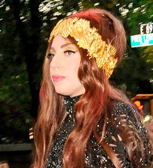 Lady Gaga tattooed at perfume launch party