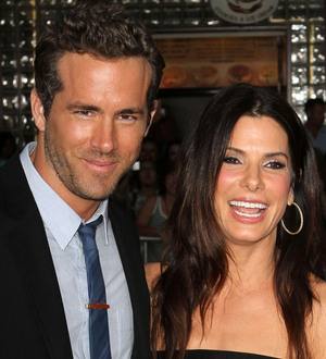 Ryan Reynolds takes Sandra Bullock as premiere date