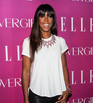 Kelly Rowland goes topless for album cover