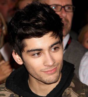 Sick Zayn Malik walks out of One Direction press conference