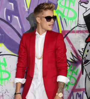Justin Bieber spray-paints at concert movie premiere