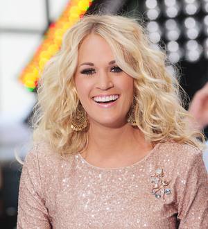 Brad Paisley surprises Carrie Underwood at Nashville concert