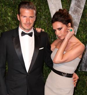 David and Victoria Beckham pay tribute to the Queen