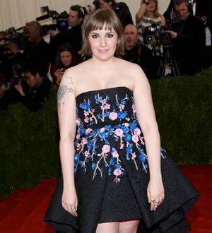 Lena Dunham defends butt-biting dog